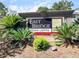 Community sign that reads East Bridge Town Lofts with tropical landscaping at 268 Alexandra Dr # 9, Mount Pleasant, SC 29464
