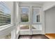 Bright sunroom with large windows, offering stunning views and hardwood floors, perfect for relaxation at 268 Alexandra Dr # 9, Mount Pleasant, SC 29464