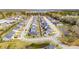 Aerial view of a well-planned community featuring a scenic waterfront and neatly arranged houses at 2916 Cavalcade Cir, Johns Island, SC 29455