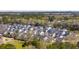 Panoramic aerial view of a residential area surrounded by lush trees, offering a serene and peaceful atmosphere at 2916 Cavalcade Cir, Johns Island, SC 29455