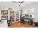 Office area featuring wood floors, many windows, and built in shelving at 2916 Cavalcade Cir, Johns Island, SC 29455