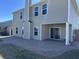 Exterior view showcasing a brick paver patio and the back of the house at 3059 Adventure Way, Ladson, SC 29456