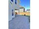 Brick paver patio extending to a large, fenced backyard at 3059 Adventure Way, Ladson, SC 29456