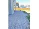 Brick paver patio extends into the spacious backyard with fencing at 3059 Adventure Way, Ladson, SC 29456