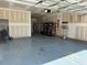 Spacious garage with ample storage and organization potential at 3059 Adventure Way, Ladson, SC 29456