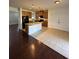 Open kitchen featuring a center island with granite countertop, stainless steel appliances, and ample cabinet space at 3059 Adventure Way, Ladson, SC 29456