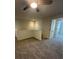 A well-lit loft space features neutral walls and plush carpeting at 3059 Adventure Way, Ladson, SC 29456