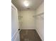 A well-organized walk-in closet features carpeting, white walls, and wire shelving at 3059 Adventure Way, Ladson, SC 29456