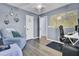 Bedroom features hardwood floors and work space at 306 Slow Mill Dr, Goose Creek, SC 29445
