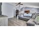 Comfortable living room features hardwood floors, and open access to the kitchen at 306 Slow Mill Dr, Goose Creek, SC 29445