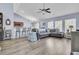 Bright and airy living room with vaulted ceilings, hardwood floors, and comfortable seating area at 306 Slow Mill Dr, Goose Creek, SC 29445
