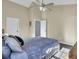 Spacious main bedroom with ceiling fan and ensuite bath at 306 Slow Mill Dr, Goose Creek, SC 29445