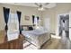 Main bedroom features lots of light, ceiling fan and ensuite bath at 306 Slow Mill Dr, Goose Creek, SC 29445