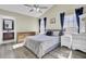 Inviting main bedroom with vaulted ceilings, hardwood floors, and en-suite bathroom at 306 Slow Mill Dr, Goose Creek, SC 29445