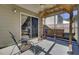 Relaxing screened-in porch with wooden beams and a swing, offering a cozy outdoor retreat at 306 Slow Mill Dr, Goose Creek, SC 29445