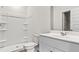 Clean white bathroom features a shower and tub, and updated fixtures at 312 Pine Crest View Dr, Summerville, SC 29486