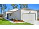 Charming one-story home with a one car garage, and simple landscaping at 312 Pine Crest View Dr, Summerville, SC 29486