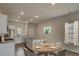 Bright eat-in kitchen features stainless steel appliances and granite countertops at 312 Pine Crest View Dr, Summerville, SC 29486