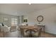Open-concept living area with hardwood floors and lots of space to entertain at 312 Pine Crest View Dr, Summerville, SC 29486
