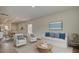 Comfortable living room with lots of natural light, stylish furniture, and a view into the kitchen at 312 Pine Crest View Dr, Summerville, SC 29486