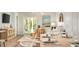 Open floor plan showcasing a dining area with seating adjacent to the living room at 313 Pine Crest View Dr, Summerville, SC 29486