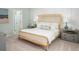 Serene bedroom with a stylish bed frame, soft lighting, and elegant furnishings at 313 Pine Crest View Dr, Summerville, SC 29486