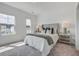 Bright bedroom with natural light, a comfortable bed, stylish decor, and modern furnishings at 339 Trailmore Ln, Summerville, SC 29486