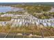 Beautiful aerial view of the neighborhood with houses, streets, and waterway views at 384 Blowing Fresh Dr, Charleston, SC 29492