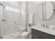 Bathroom featuring glass shower, seat, and grey vanity at 384 Blowing Fresh Dr, Charleston, SC 29492