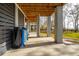 Spacious covered patio for outdoor activities such as entertaining with classic games and waterfront views at 384 Blowing Fresh Dr, Charleston, SC 29492