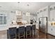 Spacious kitchen with a large center island, stainless steel appliances and ample counter space at 384 Blowing Fresh Dr, Charleston, SC 29492