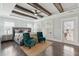 Comfortable primary bedroom with beamed ceilings, neutral tones, and an abundance of natural light at 384 Blowing Fresh Dr, Charleston, SC 29492