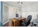 Office with wainscoting, french doors, and wood desk at 384 Blowing Fresh Dr, Charleston, SC 29492