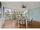 Relaxing screened porch with comfortable seating and scenic views of the water at 384 Blowing Fresh Dr, Charleston, SC 29492