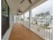 Large porch with railing, ceiling fans, and neighborhood views at 384 Blowing Fresh Dr, Charleston, SC 29492