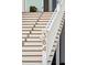 Elegant staircase with inset lighting and prominent house number, leading to the entrance at 384 Blowing Fresh Dr, Charleston, SC 29492
