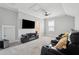 Home theater with comfortable seating, a ceiling fan, and a large screen for entertainment at 384 Blowing Fresh Dr, Charleston, SC 29492
