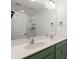 Modern bathroom featuring a dual-sink vanity and a tiled walk-in shower at 407 Stoneleigh Ln, Moncks Corner, SC 29461
