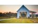Community clubhouse with covered picnic area and lake views offers residents a gathering space at 407 Stoneleigh Ln, Moncks Corner, SC 29461
