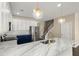 Modern kitchen featuring a marble countertop island, stainless steel appliances, and stylish pendant lighting at 407 Stoneleigh Ln, Moncks Corner, SC 29461