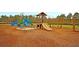 A wonderful community playground featuring slides, swings, and climbing structures for the  at 407 Stoneleigh Ln, Moncks Corner, SC 29461