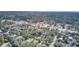 Expansive aerial view of a residential area bordered by a dense forest, revealing community charm and serene natural surroundings at 409 Klein St, Walterboro, SC 29488