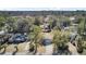 Aerial view showcasing the property's location, surrounding neighborhood, and lush greenery at 409 Klein St, Walterboro, SC 29488