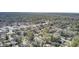 Sweeping aerial view of a community next to a sprawling forest, showcasing the harmony between suburban living and nature at 409 Klein St, Walterboro, SC 29488