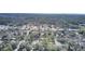 Panoramic aerial shot of a tranquil town surrounded by a vast forest, highlighting the serene blend of nature and community at 409 Klein St, Walterboro, SC 29488