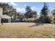 Large backyard with a well-maintained lawn offering plenty of space for outdoor activities and enjoyment at 409 Klein St, Walterboro, SC 29488
