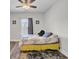 Cozy bedroom with wood floors, soft natural light, and a comfortable bed setting at 409 Klein St, Walterboro, SC 29488