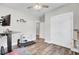 Bedroom featuring a ceiling fan, a functional workspace and easy access to a closet at 409 Klein St, Walterboro, SC 29488