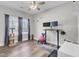 Bedroom featuring a ceiling fan, ample natural light, and a functional workspace at 409 Klein St, Walterboro, SC 29488