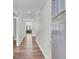 Bright entryway with hardwood floors and views into the living area at 409 Klein St, Walterboro, SC 29488